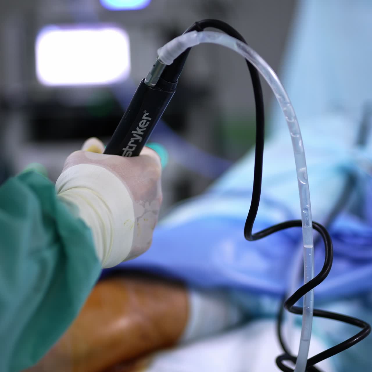 Advanced device in the hands of the surgeon. Modern equipment used in contemporary surgical procedures. Close up