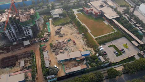 aerial drone shot capturing a massive construction site in noida india