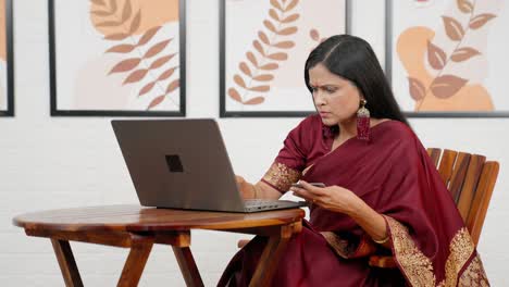 indian woman using credit card