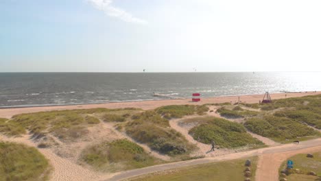 Drone-flying-towards-ocean-in-Denmark