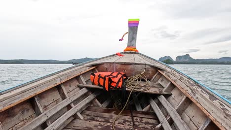 boat travels through scenic krabi waters