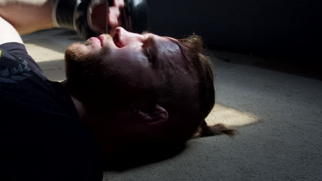 man sleeping on floor