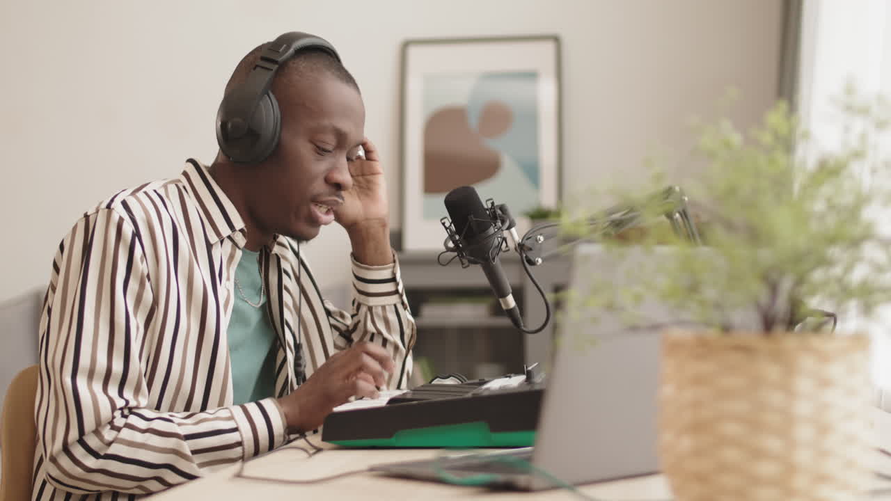 African American Man Making Electronic Music