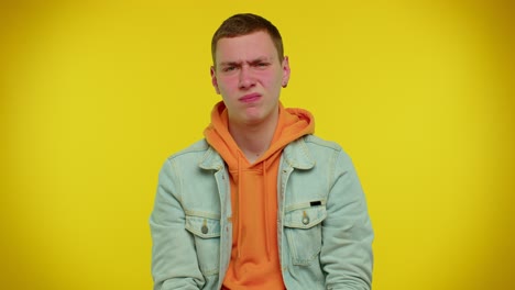 displeased upset man dissatisfied with bad quality, wave hand, shake head, dismiss awful idea