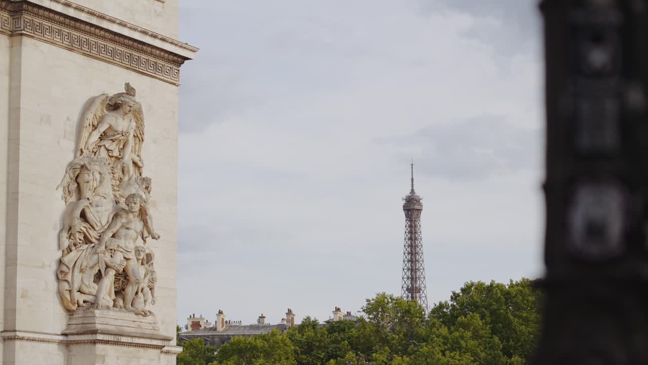 Arc de Triomphe Sculpture with Eiffel Tower in Background