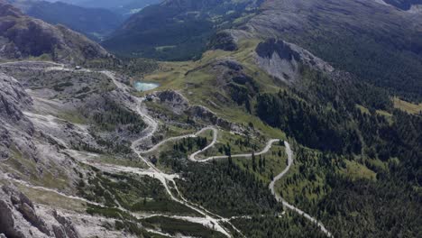 aerial view over valparola pass with views of marmolada mountain, dolomites