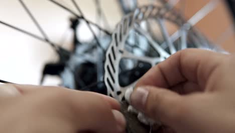 cleaning brake pads on a bicycle