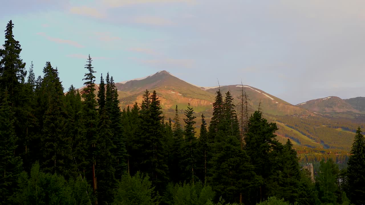 Static video of a nature scene in Breckenridge, Colorado.. Trees and mountains can be seen.