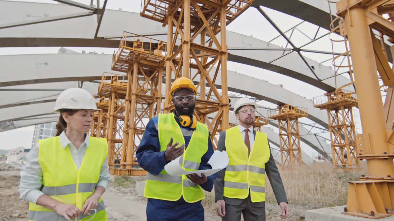 Foreman Showing Construction Site to Supervisors