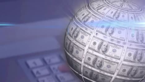 animation of rotating globe of dollar bills and moving beam of light over computer keyboard