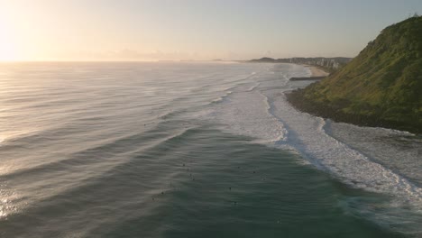 Aerial-views-over-Burleigh-Heads-at-sunrise,-Gold-Coast,-Queensland,-Australia