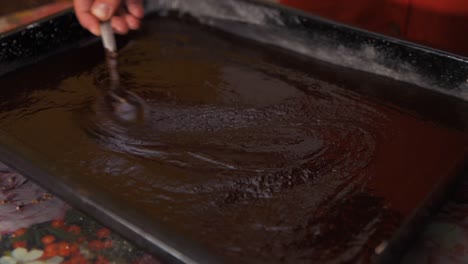 Smoothing-out-cake-with-spoon-slow-motion-birthday-celebration