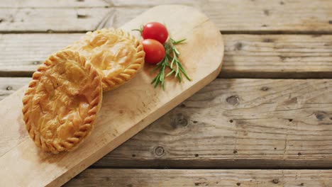 Video-of-pies-seen-from-above-on-wooden-background