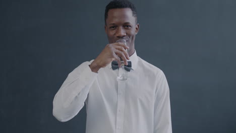 man celebrating with a champagne toast