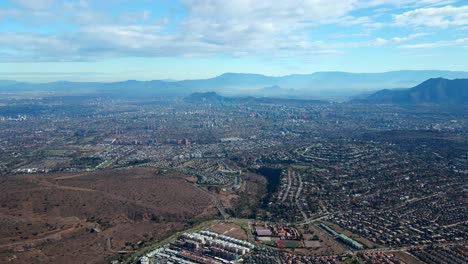 Aerial-orbit-of-Las-Condes,-Santiago,-Chile