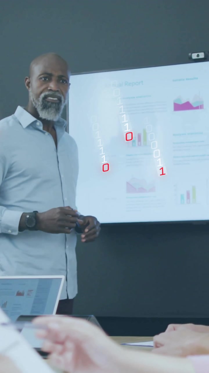 Animation of data processing over diverse colleagues discussing work in office