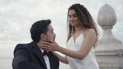 couple touching faces