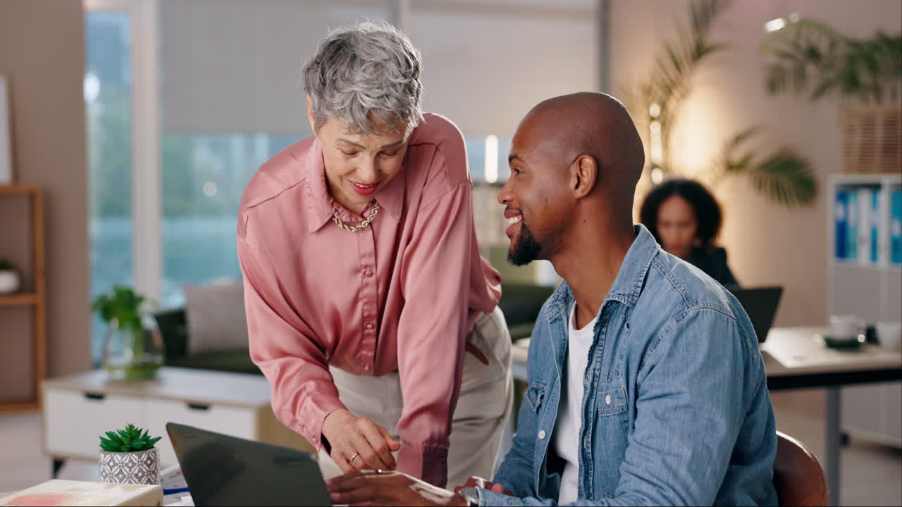 Two business colleagues collaborating in an office