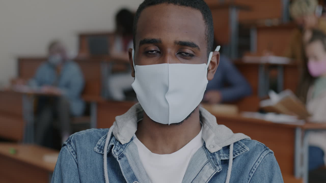 Student in a Classroom Wearing a Face Mask