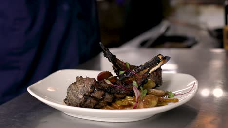 Chargrilled-Lambchops-Garnished-With-Fresh-Sage-Leaves---Main-Course-Serving---slow-motion