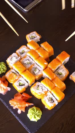 group sharing sushi rolls
