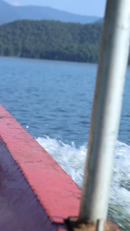 traveling by boat on a calm, scenic lake