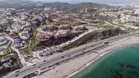 aerial drone of beach front at the coastal town of fuengirola, malaga, spain