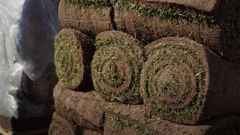 Rolled-lawn-pallets.-Ready-to-plant-material-for-a-beautiful-green-lawn.-4k-video