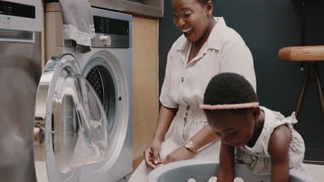 Mother,-child-and-laundry-with-high-five