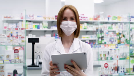 red-haired woman in a pharmacy