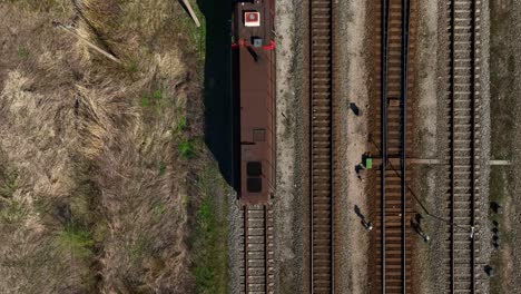 Top-view-The-locomotive-with-the-attached-wagon-is-standing-on-the-track