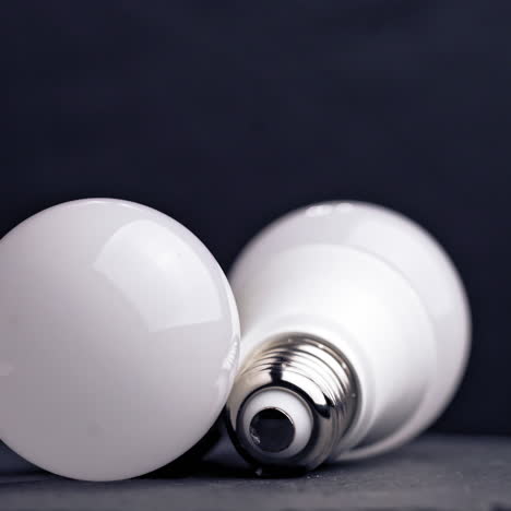 lighting electric lamps for living rooms led and incandescent bulbs close-up lie on the table