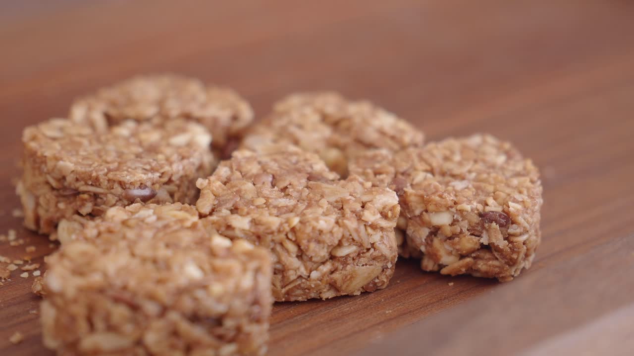 Hand picking a granola bar