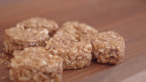hand picking a granola bar