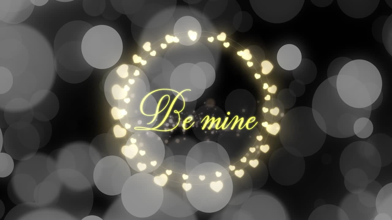 심장과 반점 위에 있는 be mine 텍스트의 애니메이션