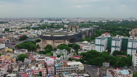 tourism development corporation with fire station and government super speciality hospital at wallajah road, anna salai, triplicane, chennai, tamil nadu, india. day time, sami orbit, drone shot, 4k.