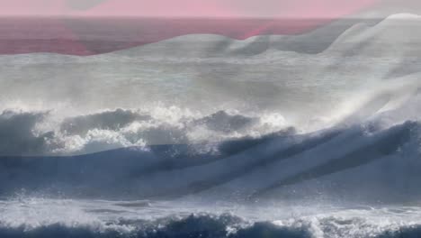 digital composition netherlands flag waving against aerial view of waves in the sea