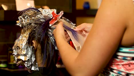 beautician applying foils