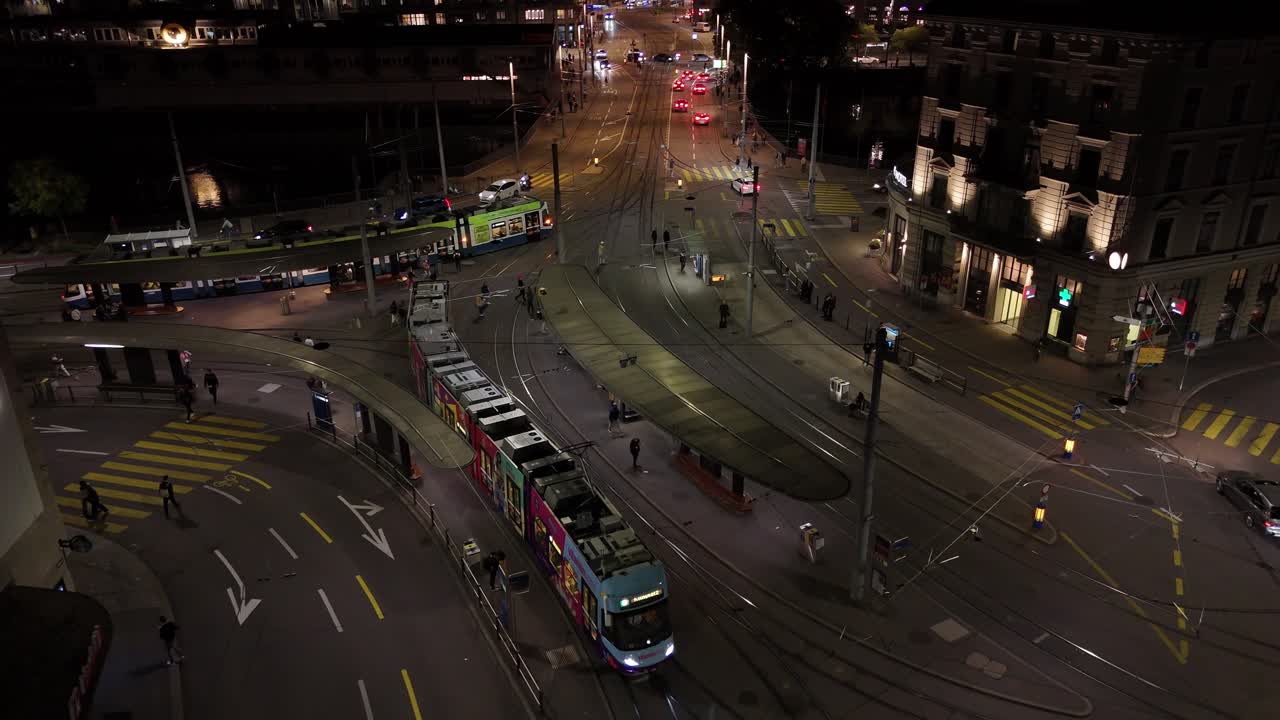 downtown trains and traffic at night in old town side of Zurich, Switzerland at night