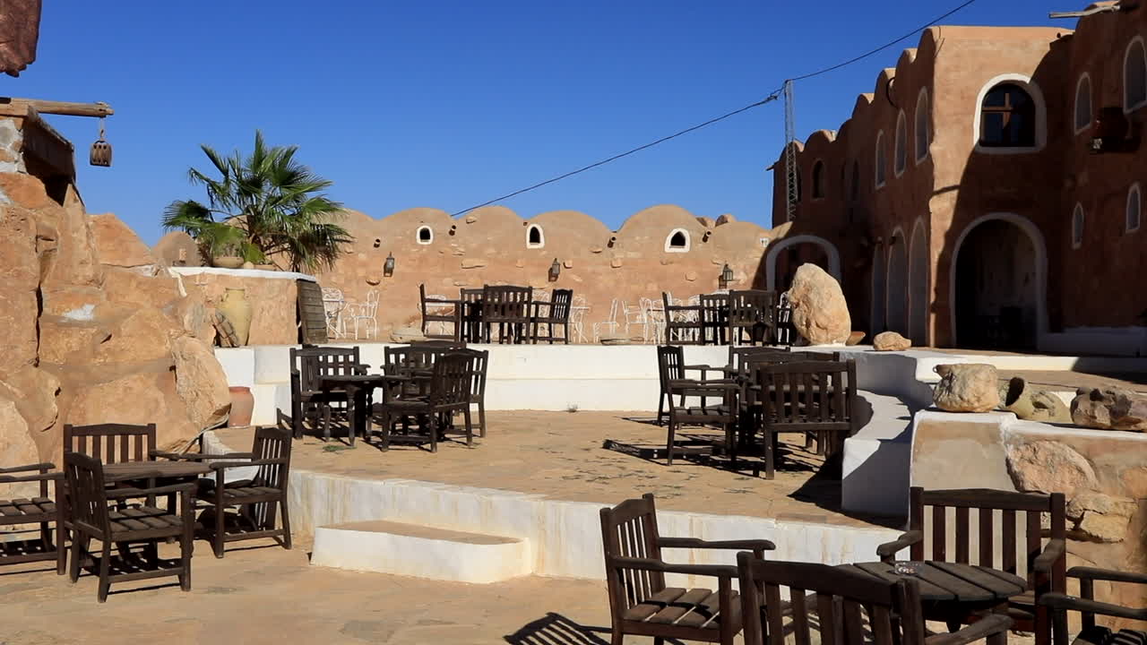 Fortified village in Tunisia with traditional architecture and blue sky