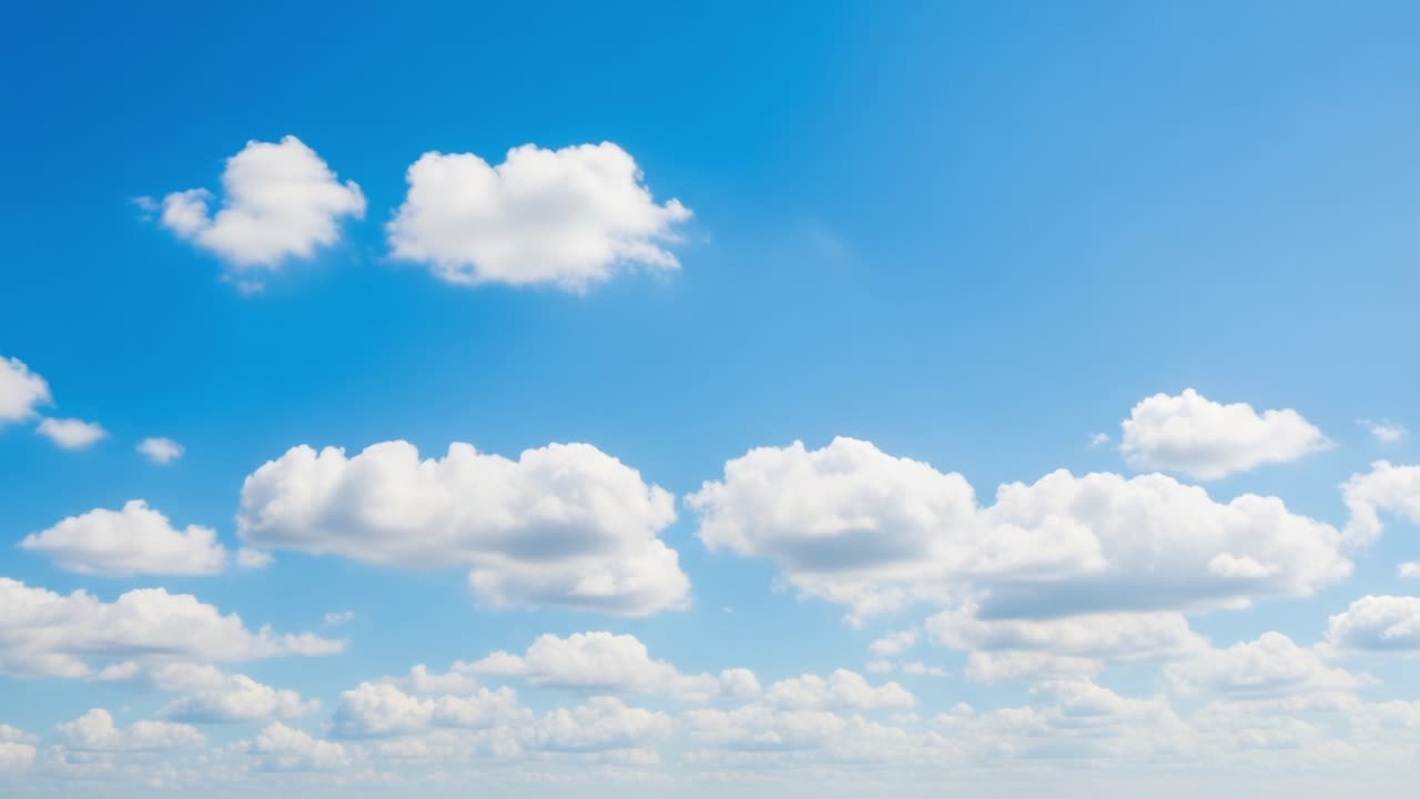 A Panoramic View of Serene Clouds Against a Clear Blue Sky, Capturing the Tranquility of Nature's Beauty and the Vastness of Open Air Spaces