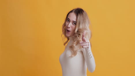 happy woman posing in studio