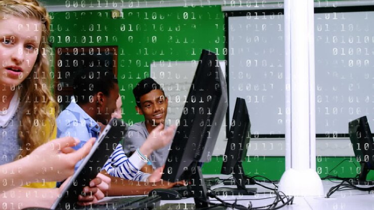 Students working with computers while numbers move
