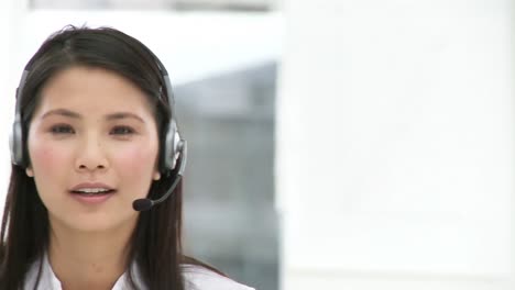 smiling customer agent with headset on