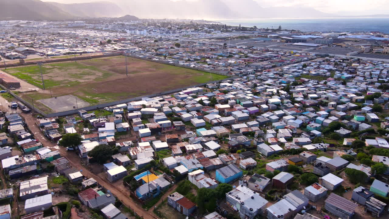 Zwelihle ghetto township on outskirts of popular seaside resort Hermanus, aerial
