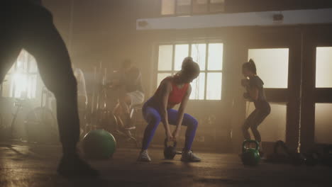 group kettlebell workout in a gym