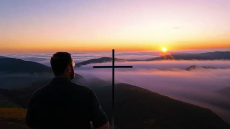 man stands on a mountain peak, admiring a breathtaking sunrise illuminating a sea of clouds below