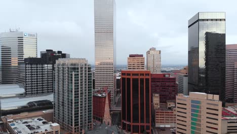 aerial tilting up pan over in downtown denver colorado just after sunrise