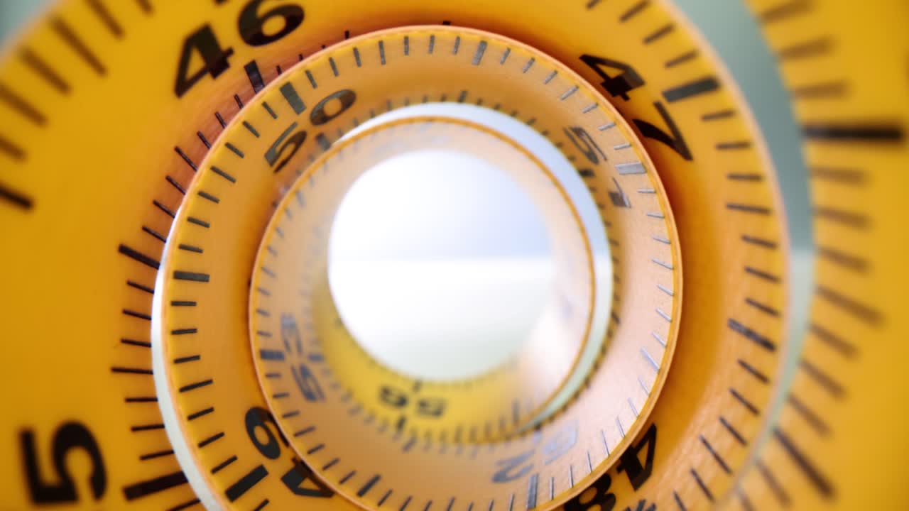 Close-up of a spiraling tape measure
