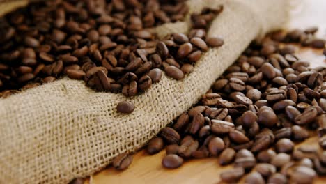 roasted coffee beans on sack textile